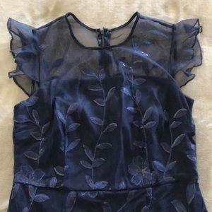 Navy blue cocktail dress.